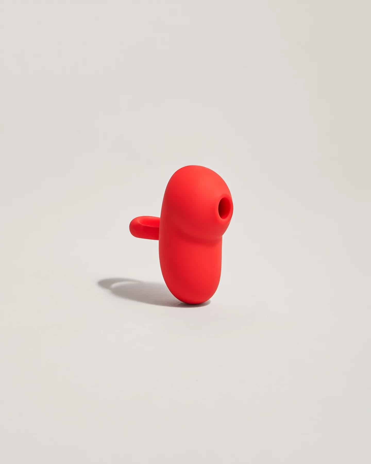Succionador-clitoris-portatil-rojo-meibi-beli_1440x1800